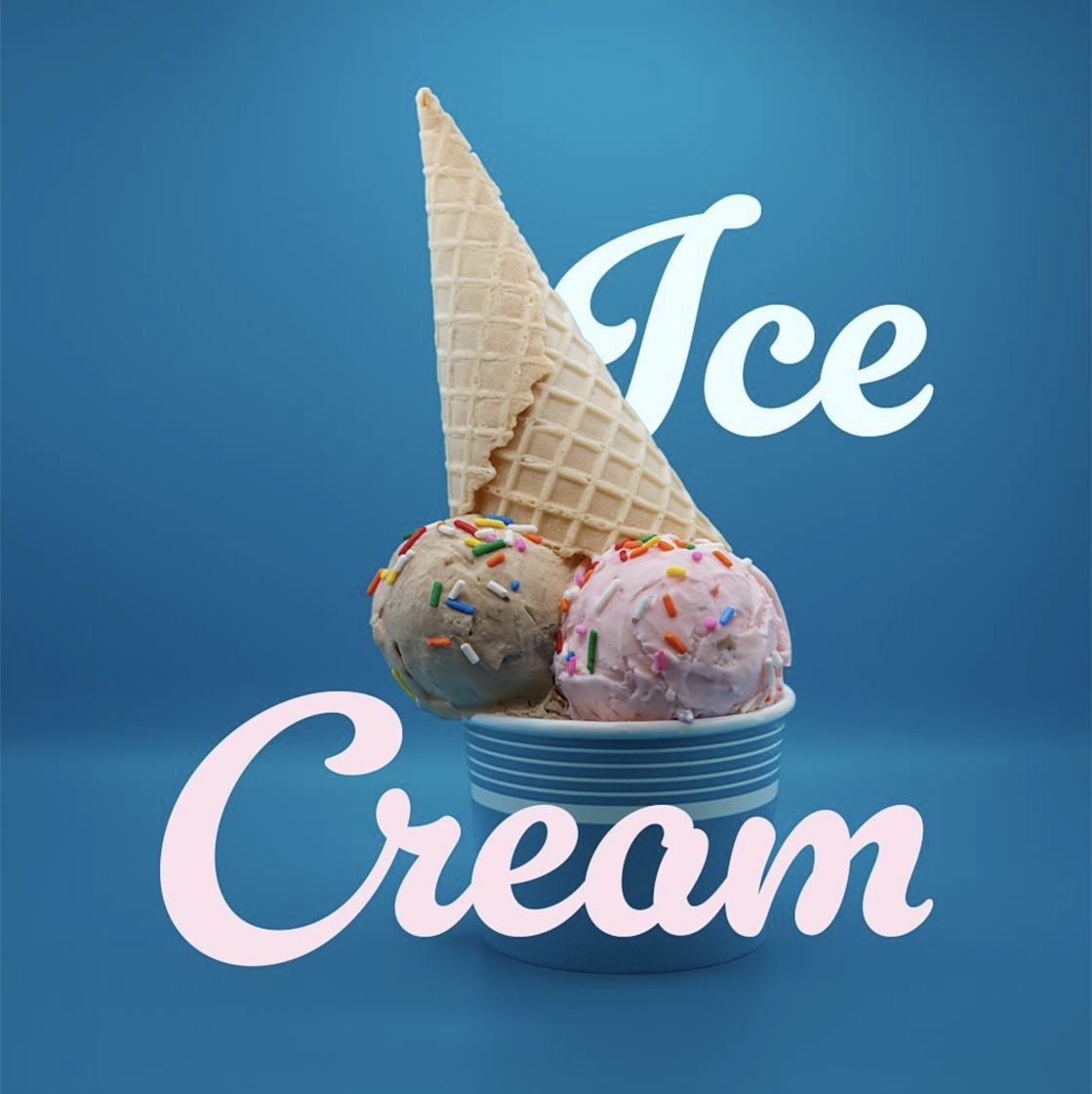 Two scoops of ice cream with sprinkles and a waffle cone